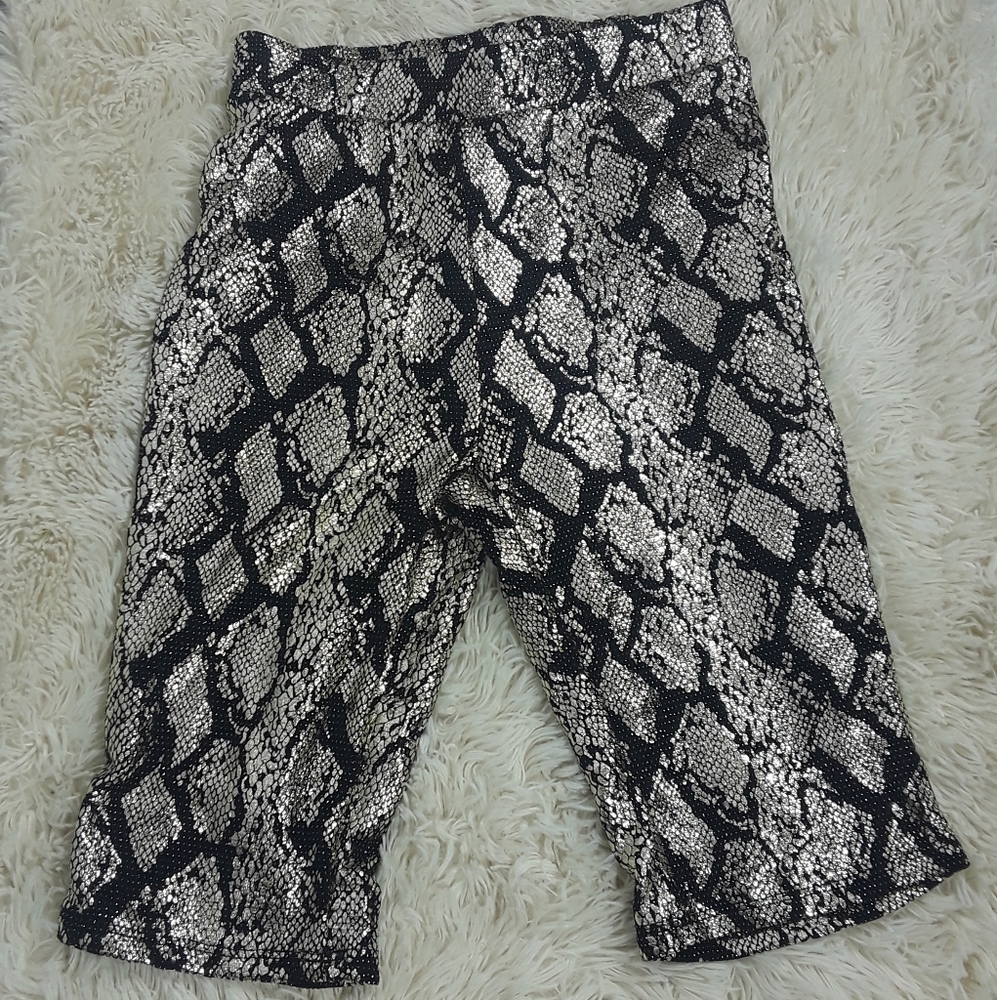 Know one cares Python XS shorts. NWT